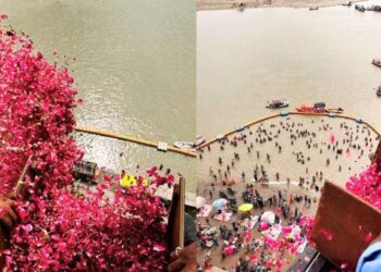 Prayagraj administration showers flower petals on kanwariyas from helicopter