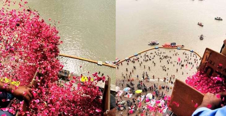 Prayagraj administration showers flower petals on kanwariyas from helicopter