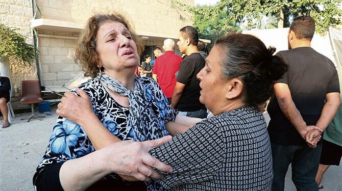 Scores killed in attack on Gaza church; Yemen fires missiles