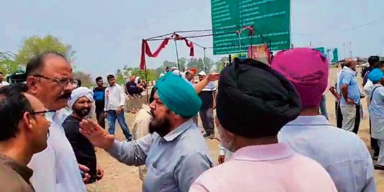 Shambhu residents and store owners demonstrate against highway blockage by protesting farmer unions.